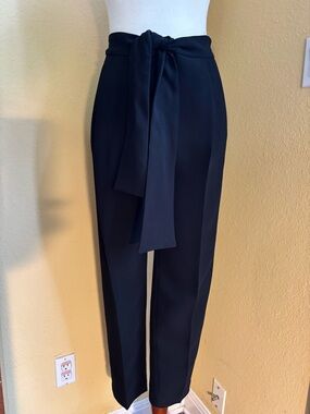 Carolina Herrera Black Trousers with Red Label and front tie. Size 4